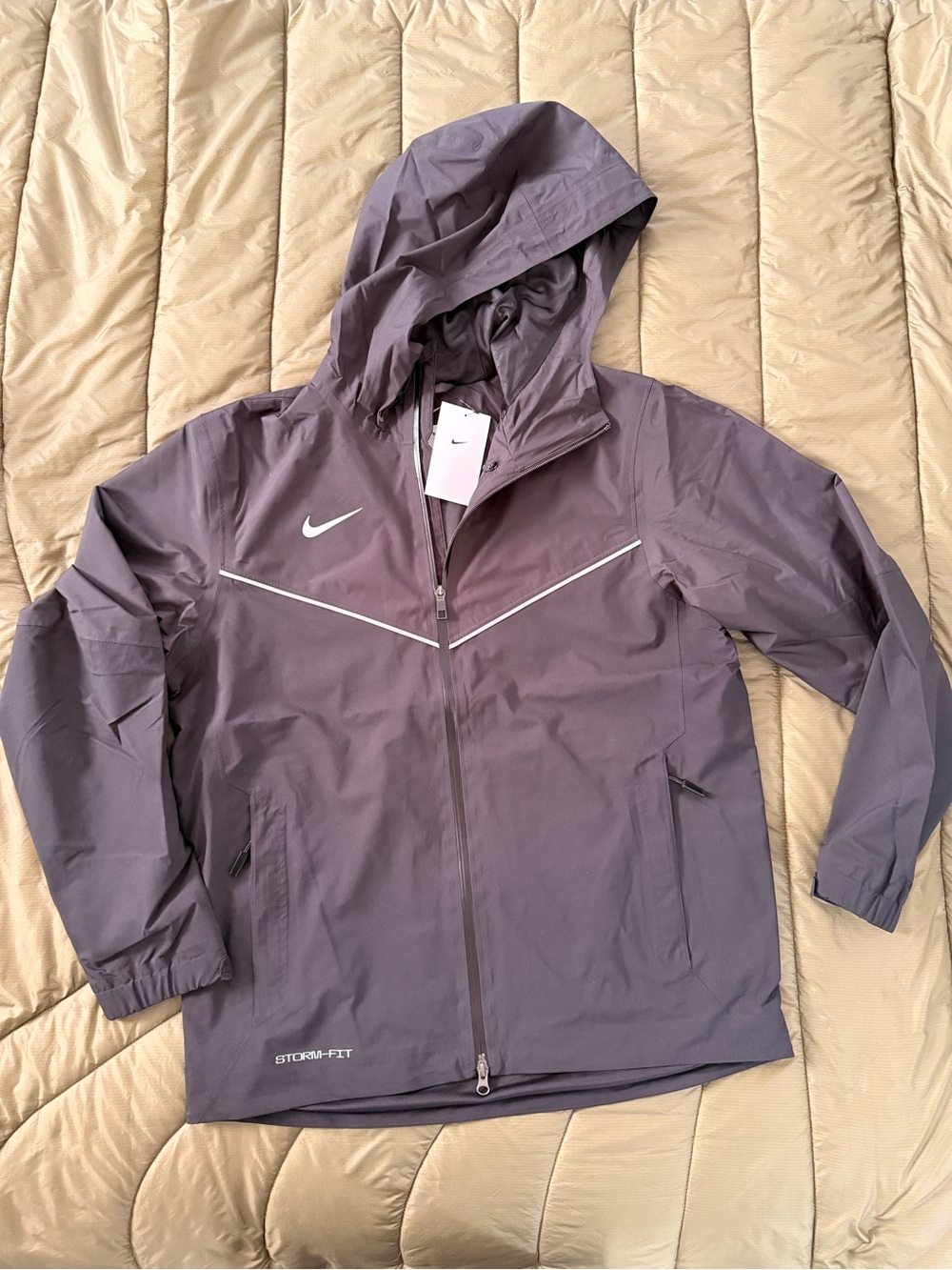 Nike FTBLL Storm-Fit Men’s ' Hooded Rain Jacket in Black, Reflective Logo & Trim